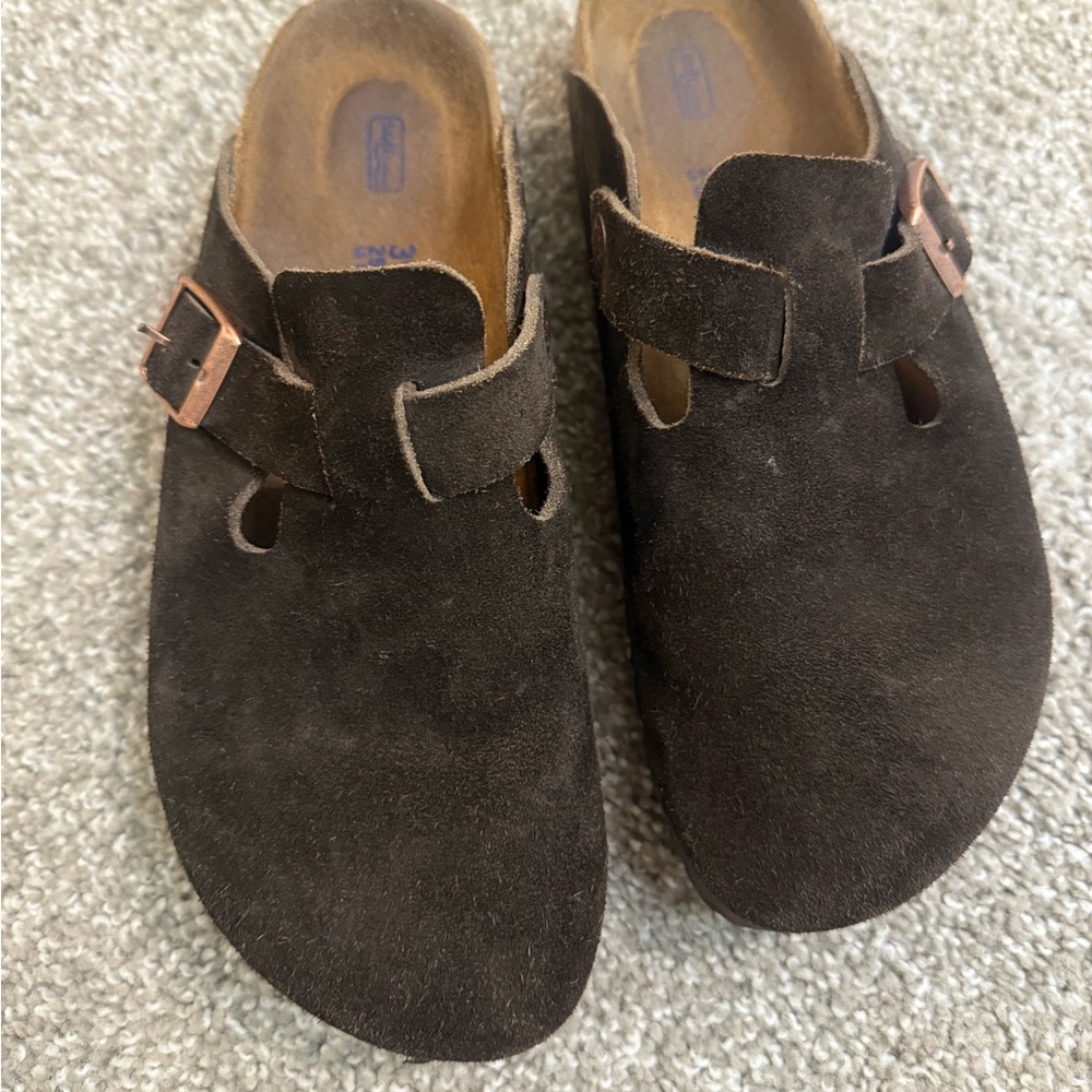 Birkenstock clogs in a dark brown color